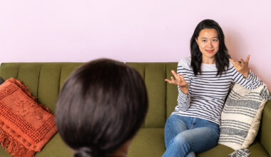 woman-sitting-in-couch-talking