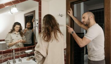 man arguing with woman in bathroom