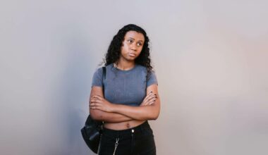 sad girl standing with arms crossed