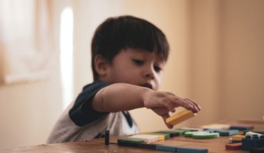 child playing on table