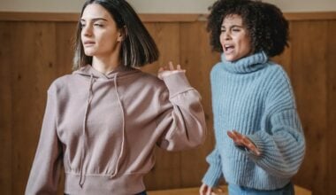 Two woman arguing, on is walking away