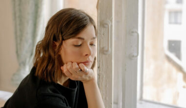 woman sitting by window