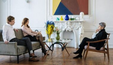 couple sitting across from therapist