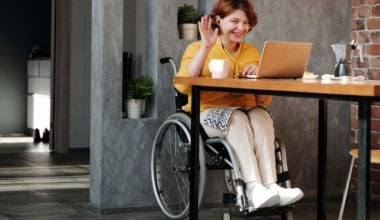 lady in a wheelchair participating in a video conference