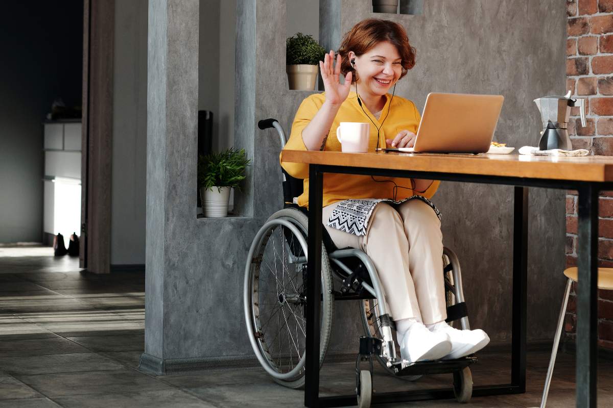 lady in a wheelchair participating in a video conference