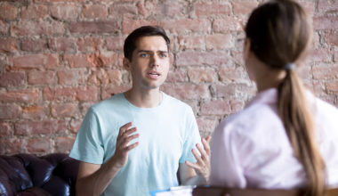 man confronting woman