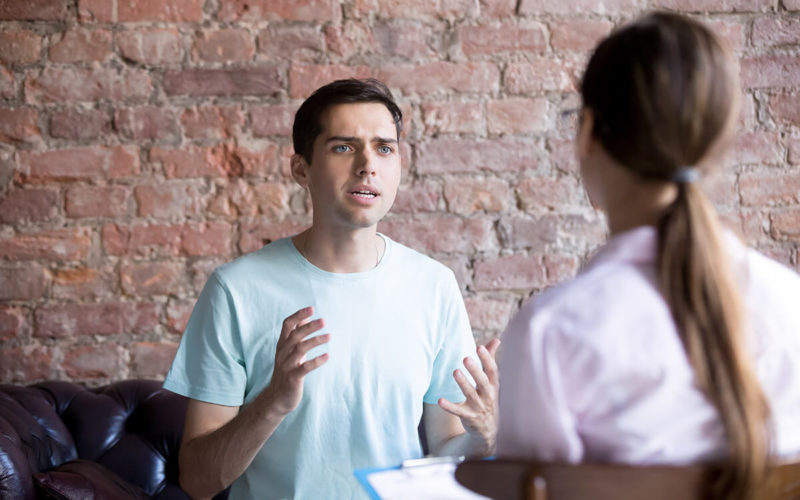 man confronting woman