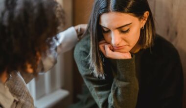 woman consoling female friend