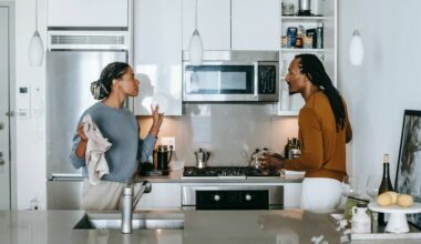 man and woman arguing in kitchen