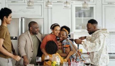 Black family gathering and embracing joyfully