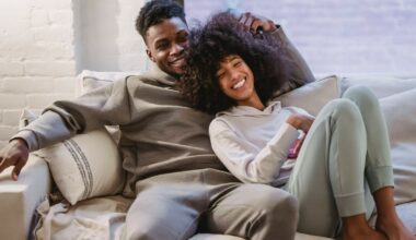 woman leaning into man on couch