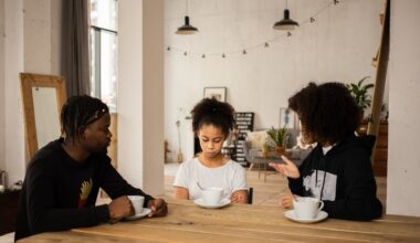 parents speaking to young daughter