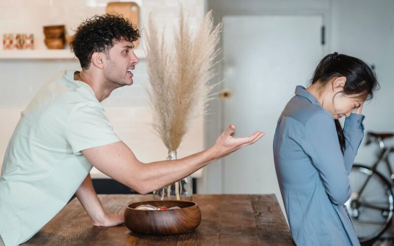 man yelling at woman