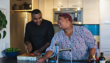 Happy couple cooking in the kitchen together