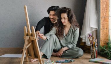 couple painting together on the floor