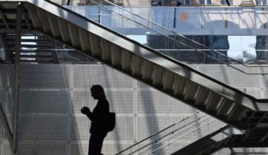 woman descending down a staircase