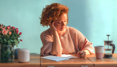 woman-writing-at-desk