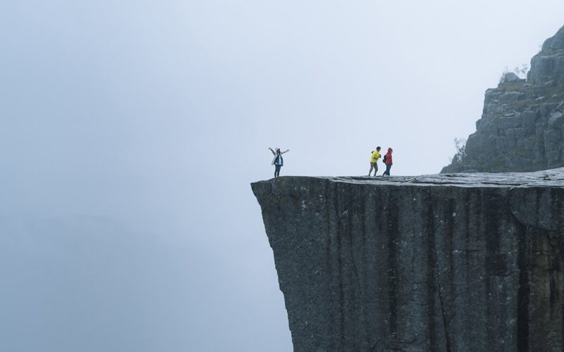 people on a cliff