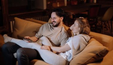 couple relaxing on couch