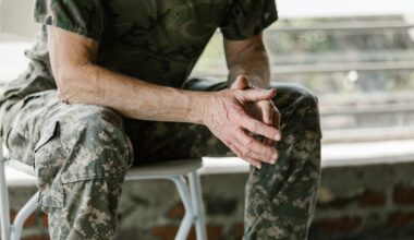 Veteran sitting on a bench in camouflage uniform