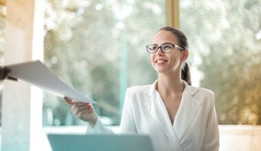 businesswoman faking good mood