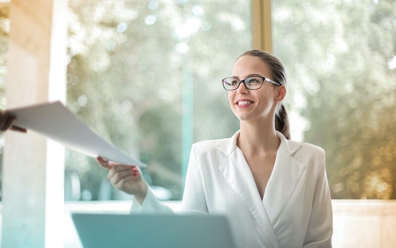 businesswoman faking good mood