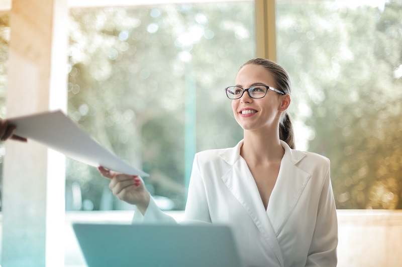 businesswoman faking good mood