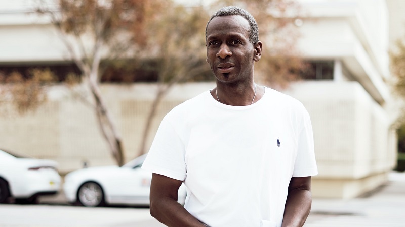 black man standing on the street