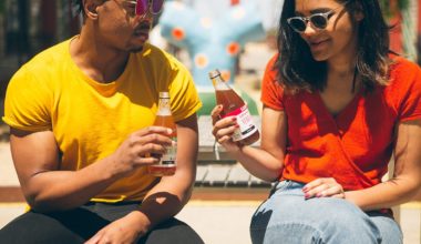 man and woman drinking juice