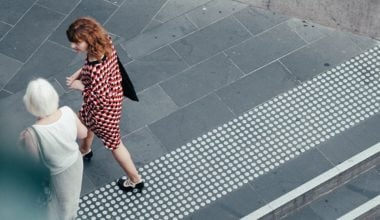 two women walking and talking