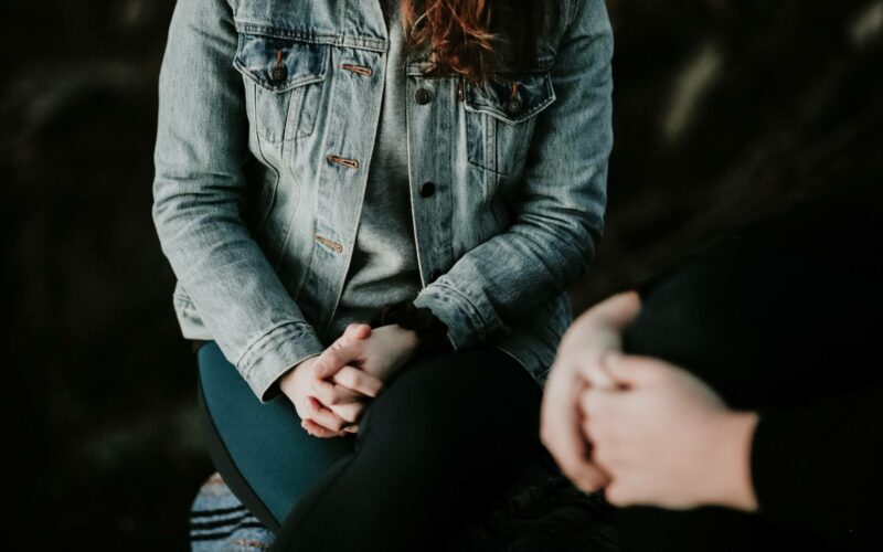 woman-holding-her-hands-together