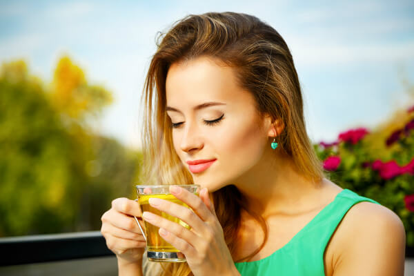 woman tea meditation