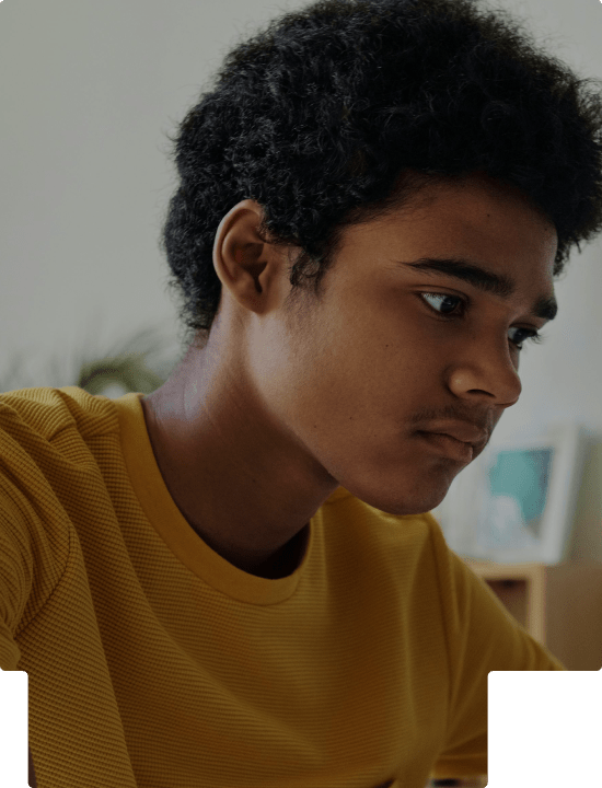 A teenager looking away, sad