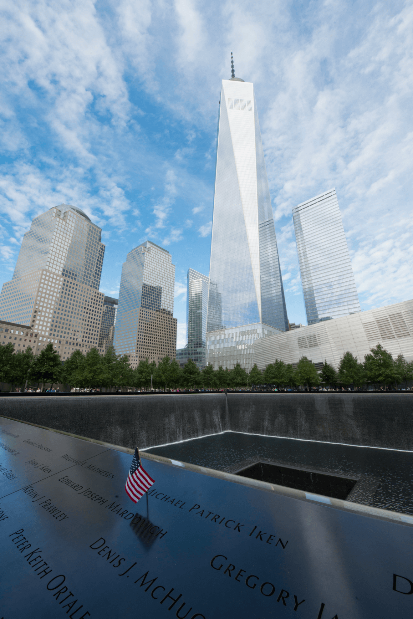 911 memorial freedom tower skyline in background