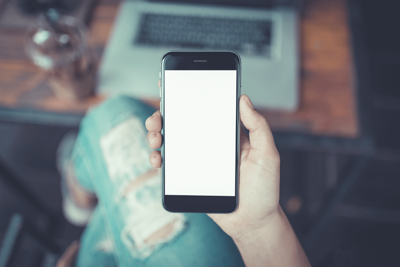 blank smartphone computer woman with ripped jeans