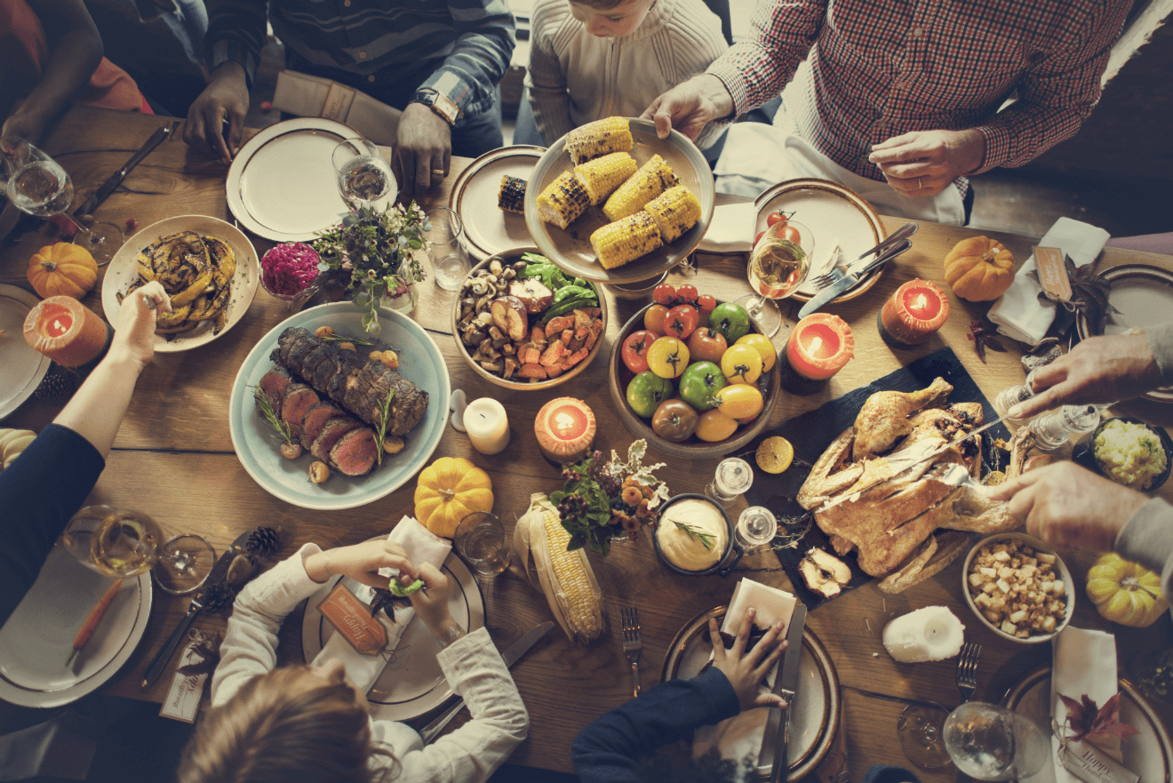 thanksgiving feast family passing plates