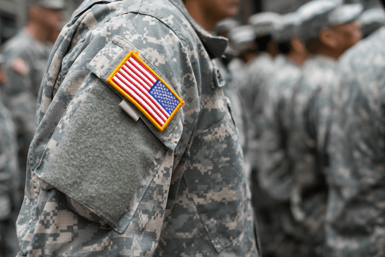 soldier in uniform with US flag patch