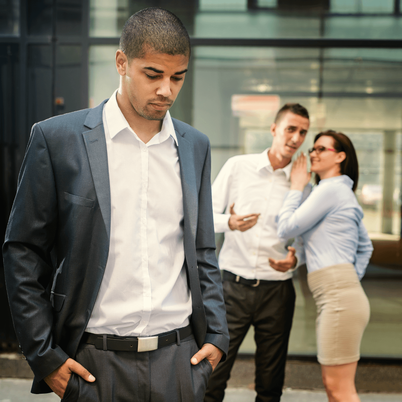 businessman co-workers excluding gossiping