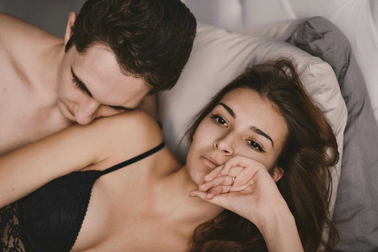 couple in bed woman not interested in sex