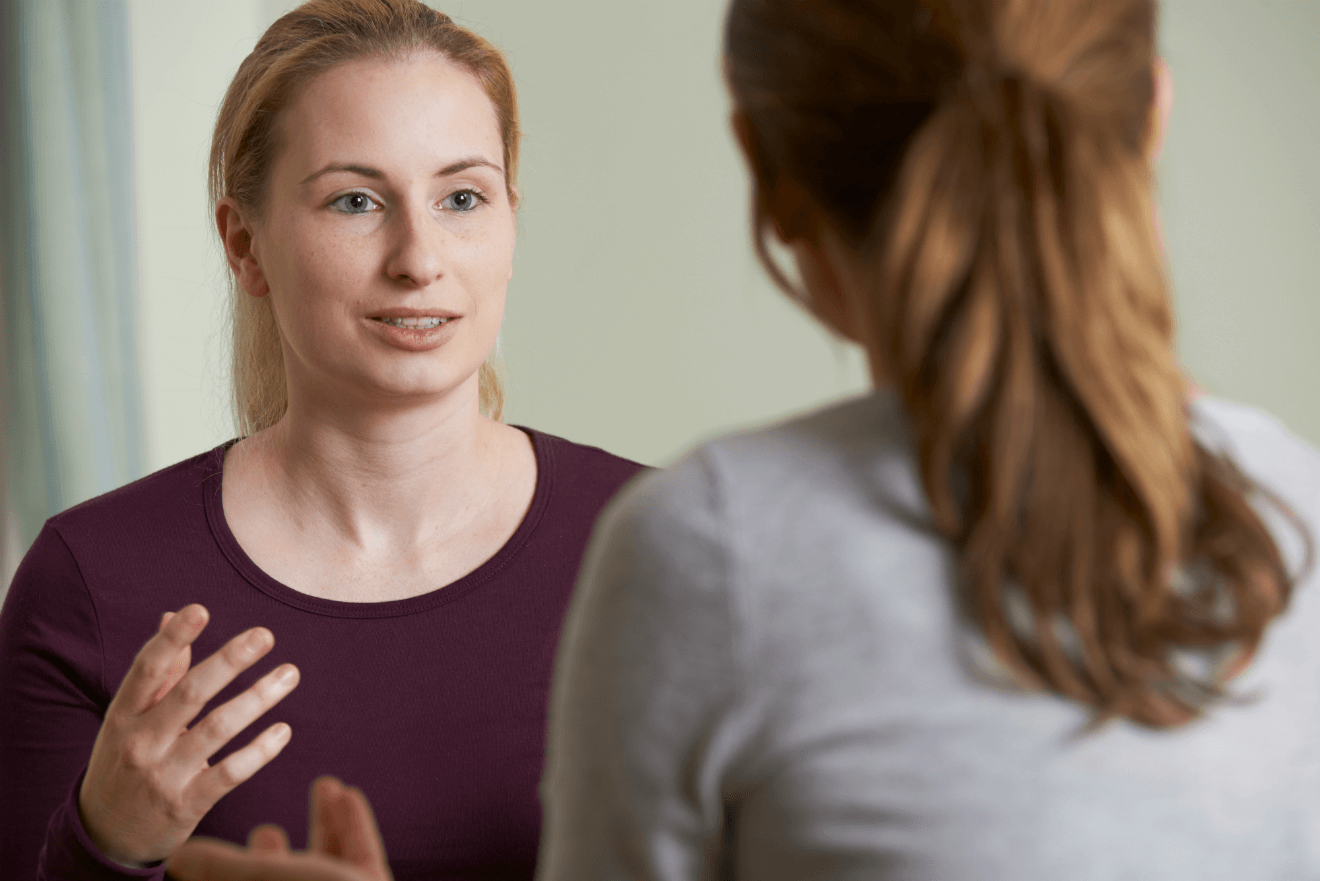 woman client therapist talking